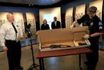 St. Louis Acting Police Chief Lawrence O'Toole (left) has a crime scene technician display the AK rifle used by a suspect who fired at police as he gives a press conference at police headquarters in St. Louis on Tuesday, Nov. 28, 2017. Police fired at and wounded the suspect at the scene in the 5900 block of Page Boulevard.Photo by David Carson, dcarson@post-dispatch.com