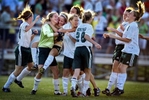Nerinx Hall girls soccer team members celebrate their overtime penalty kick shootout win over Cor Jesu in St. Louis County, Mo. on Thursday May 19, 2005.