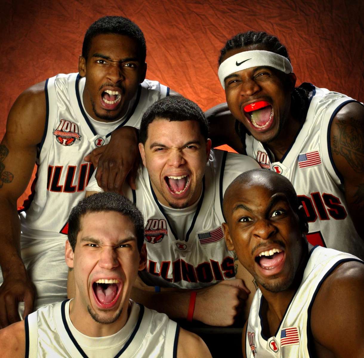 The 2005 Illinois mens basketball team Luther Head, top left, Dee Brown, top right, Deron Williams, center, James Augustine, bottom left, and Roger Powell, bottom right, display some of the fire that propelled them to finisht the regular season 29-1 in Champagne, Ill. on Thursday March 3, 2005.  