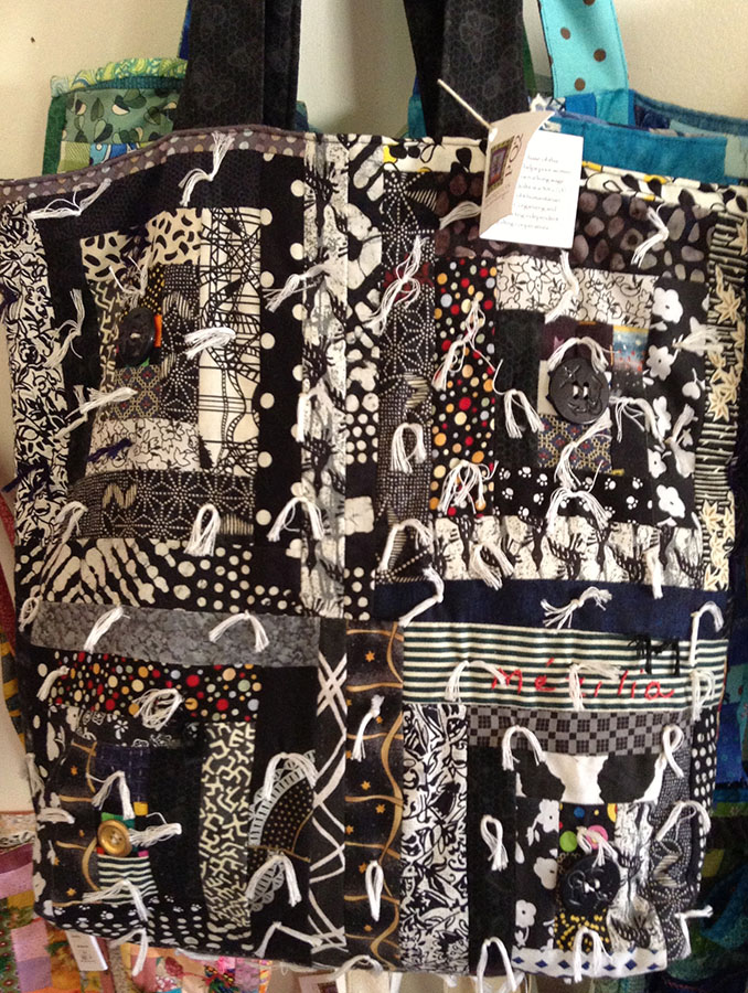 Patchwork bags by Peace Quilt artisans in Lilavois