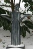 A statue of the beloved {quote}Savannah Bird Girl{quote} statue whose original sits in Savannah's Bonaventure Cemetary, made famous from John Berendt's {quote}Midnight in the Garden of Good and Evil{quote}, keeps watch over this lovely landscape and waits for spring to arrive.