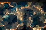 ...the blue glass block is creatively illuminated from underneath to increase the appeal of this unique landscape feature in the evening!