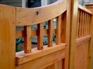 The custom cedar fencing adds to the Asian tone set throughout this design.