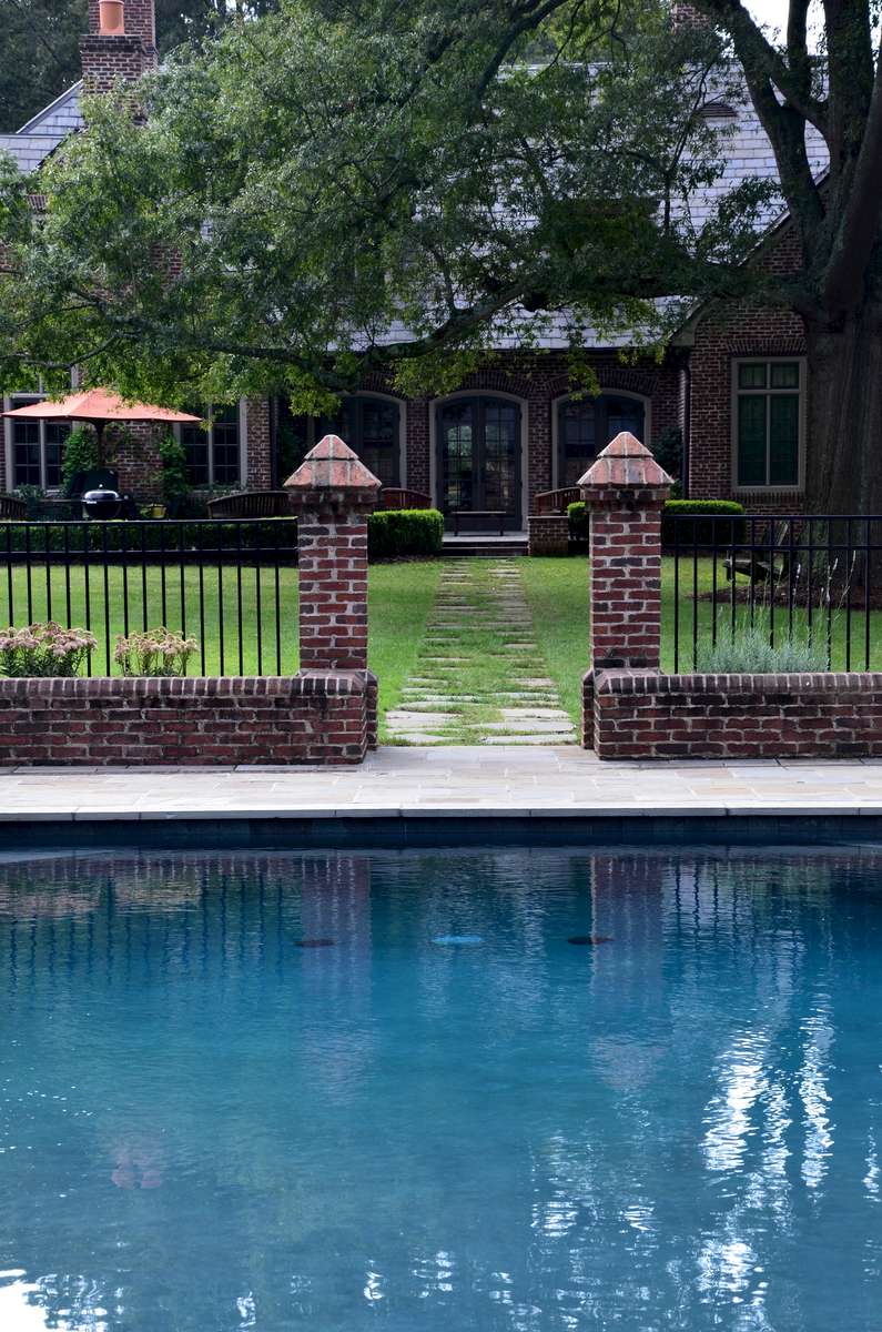 The vintage columns that mark the entrance to the pool promise solace and sanctuary for the senses.