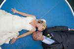creative portrait of bride and groom at Pier C in Hoboken on their wedding day