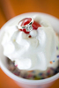 creative ring shot at ice cream shop during engagement session. Hoboken wedding photographers