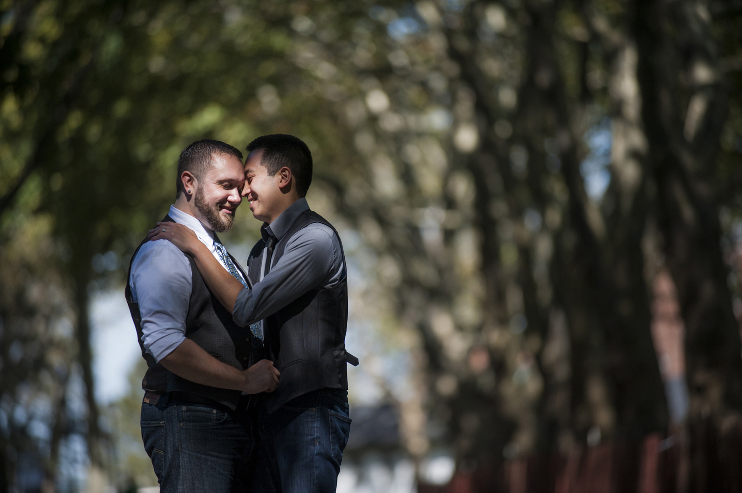 portrait of gay men's engagement photos at Governor's Island. Gay-friendly NYC wedding photographers
