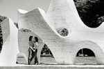 Couple in Pepsi-Co sculpture gardens. Gay-friendly NYC wedding photographers