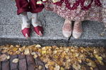 Indian wedding shoe details with fall leaves