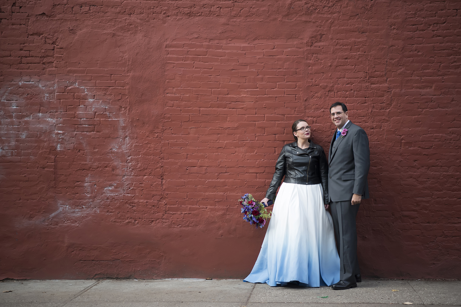 bride and groom in west village on wedding day. NYC wedding photographers