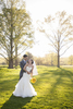 Bride and groom portrait as they bask in the sunlight during their wedding day at Preakness Hills Country Club. NJ wedding photos