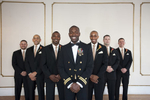 portrait of groom and groomsmen on wedding day at Manhattan Penthouse. NYC wedding photographers