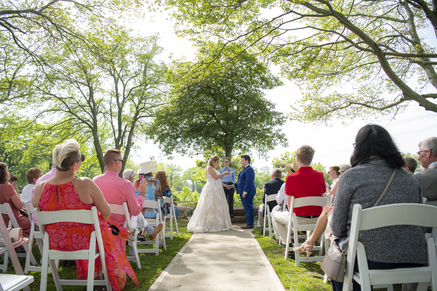 Two brides celebrate 20 years of marriage with a vow renewal in Asbury Park, NJ. 