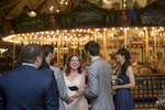wedding ceremony in front of carousel at Bear Mountain