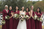 Diverse bridal party dressed in burgundy