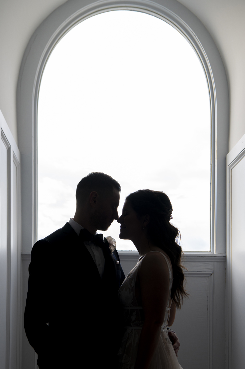 bride and groom silhouetted at Hudson House in Jersey City
