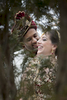 Cool bride and groom portrait amongst the trees at Hilton Pearl River