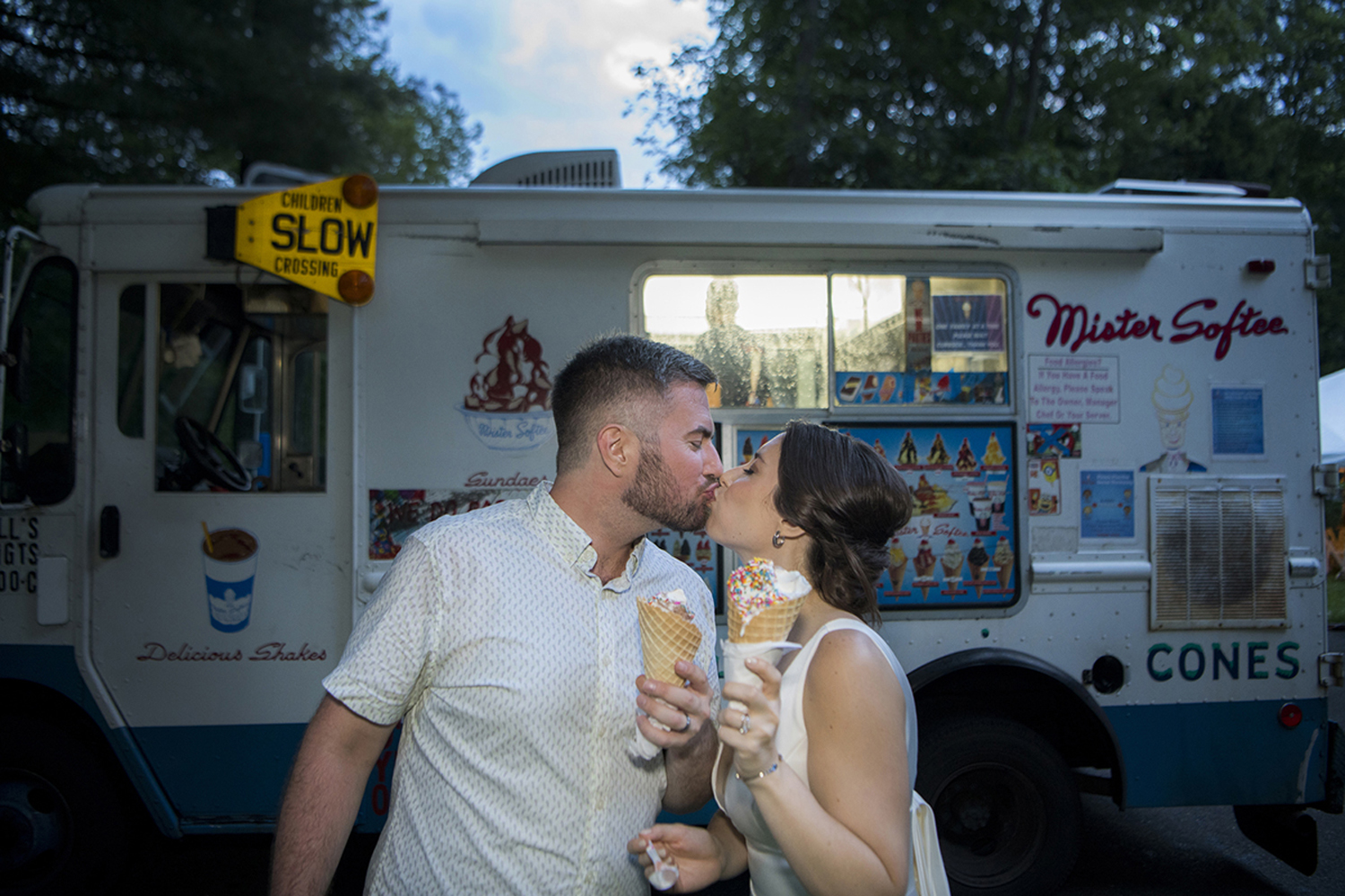 New York backyard microwedding complete with a Mister Softee ice cream truck. New York microwedding photographer