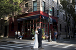 bride and groom in NYC on their wedding day. NYC wedding photographers