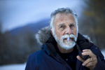 1/10/2014 - Manchester Center, VT -  Jonathan Goldsmith, cq, AKA {quote}The Most Interesting Man in the World,{quote} the cult-like figure in the highly popular Dos Equis beer commercials, lives a quiet life in the woods in Manchester Center, VT. He is trying to remake himself as the leading advocate for removing land mines and cleaning up the legacy of war in combat zones around the world. Topic: goldsmith. Story by Bryan Bender/Globe Staff. Dina Rudick/Globe Staff   