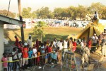 On the morning that the field hospital was ready, hundreds of people already lined up outside the gates for a chance to be given medical treatment or resources or both. Thousands of displaced Haitians remained in a {quote}Tent City{quote} immediatly adjacent to the hospital. 