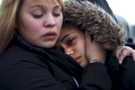 1/01/2014 - East Boston, MA - Andrew McArdle Bridge - Stephanie Ruiz, cq, left, comforted Nancy Garcia, cq, whose mother, Aura Garcia, was crushed to death on Tuesday, December 31, 2013 by the Andrew McArdle bridge in East Boston. {quote}She was basically like my mother,{quote} said Ruiz. {quote}What we want is justice,{quote} added Ruiz. Topic: 02bridge. Story by Meghan Irons/Globe Staff. Dina Rudick/Globe Staff   