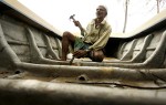 This Sri Lankan fisherman recovered his badly damaged boat and made slow progress to repair it.