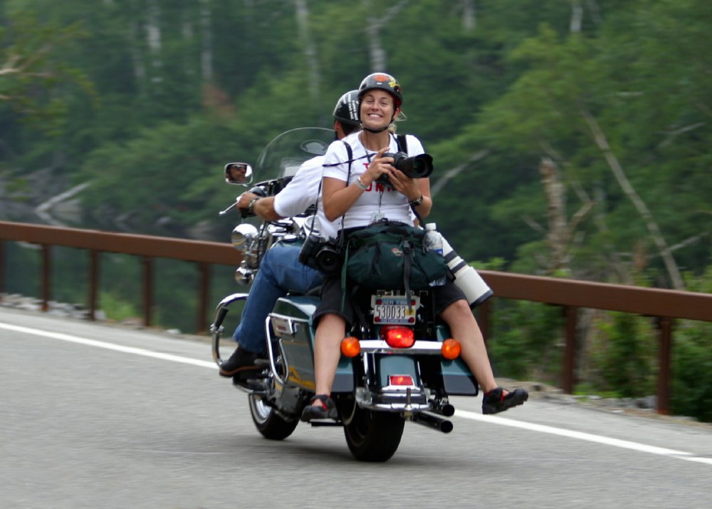 Photographing Ironman Lake Placid, NY...That smile is more a look of terror...I did not like my driver that day.