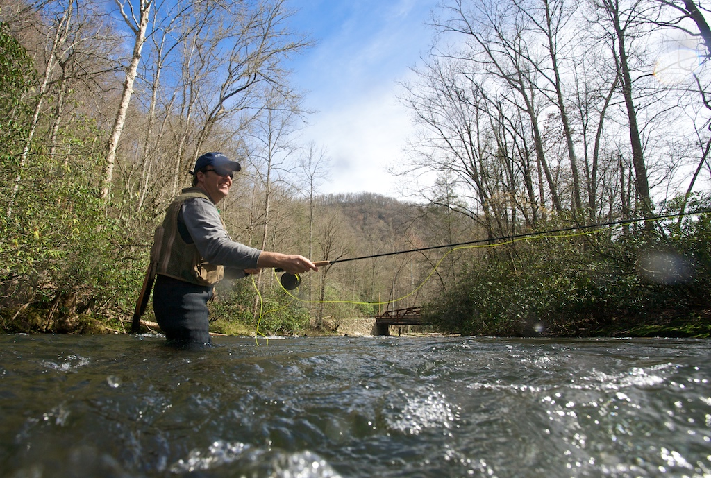 Michael Whelchel casts his line into Oconaluftee River in Ravensford, NC. 