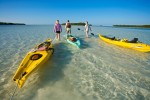 Kayaking guide Andrea Paulson, left, takes Tash Elwyn and Christopher Collier around some of the uninhabited islands off the coast of Sugarloaf Key, FL.