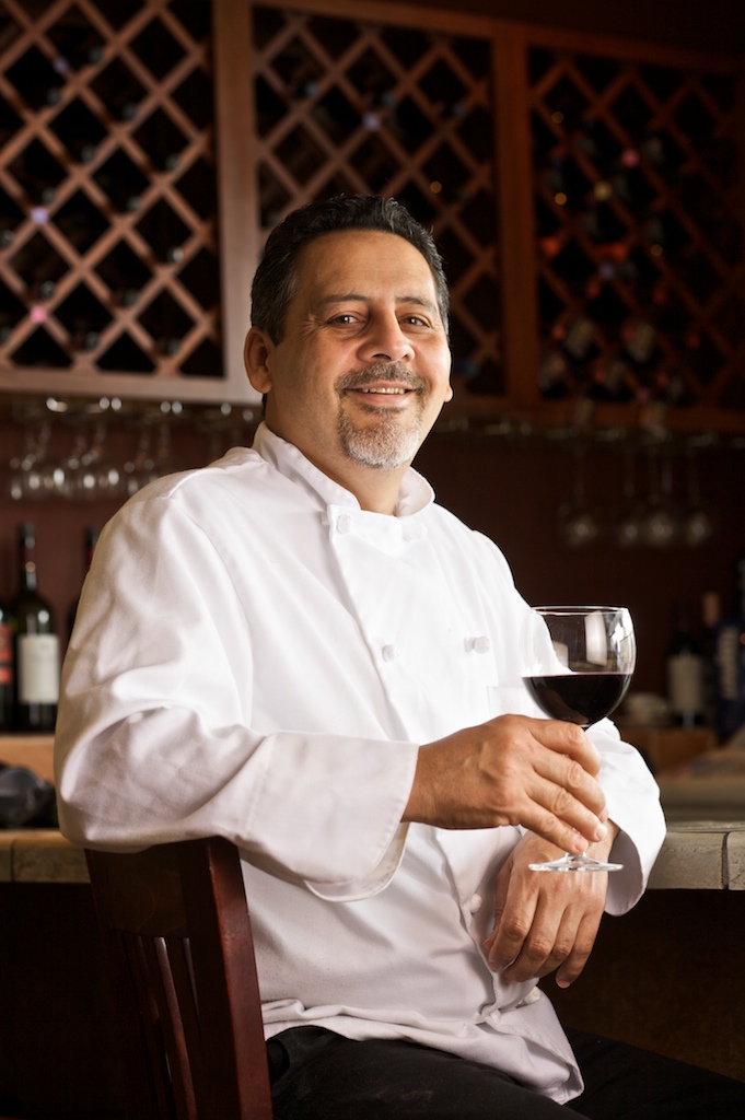 Chef Victor Gonzalez poses for a portrait at his restaurant, Traitoria D'Urbino.