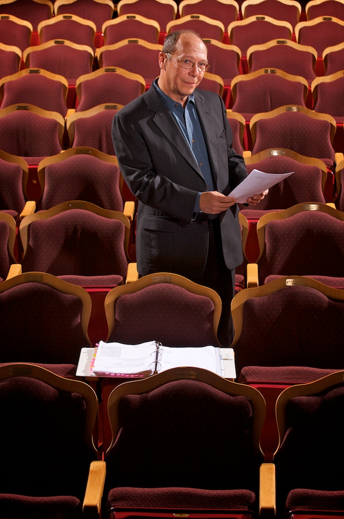 John Loesser, Director of the Lyric Theatre, poses for a portrait inside the theatre. 