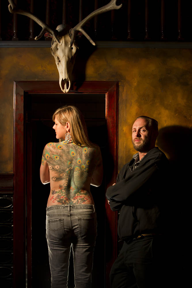 Chet Duvenci, a tattoo artist at Mercy Seat Tattoo, right,