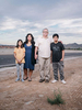 Garrett and Rosie Smith stand for a portrait with their children near the I-17 Exit 229 and Anthem Way where the family was pulled over by police and harrassed by officers. Not only were they harrased, but Rosie, who is Mexican, was questioned by officers seperatly. Shot on November 15, 2017 in Anthem, AZ.