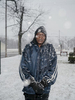 Joseph Gibbs-Bey, poses for a portrait after collecting a case of bottled water at Firehouse #3, Martin Luther King Avenue, Flint, Michigan, January 28, 2016