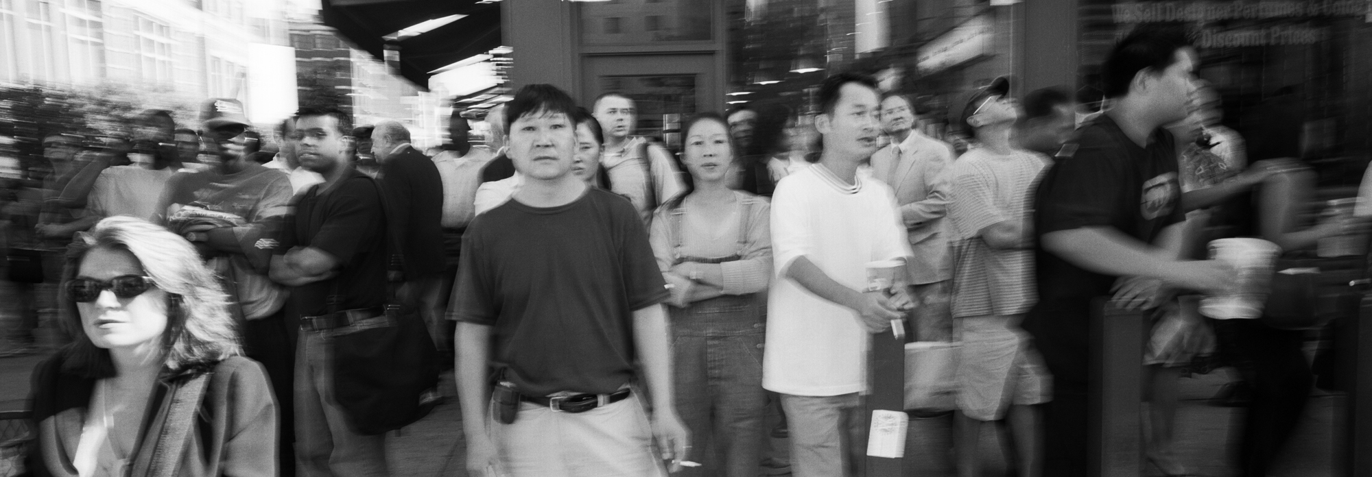 Crowds watch and wait for the North Tower to colapse. The 9/11 terrorists attacks in New York City part of a comlete edit of 100 photos. Tribeca, New York City, New York