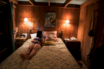 Annuska in bed Barn, Bridgehampton, New York, USA