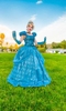 Cinderella visits a Santa Barbara neighborhood as a costumed character for hire for a children's birthday party.