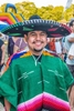 A Hispanic man wearing a  sombrero and serape at the mercado del norte during Fiesta Days in Santa Barbara, California.