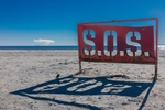 SOS artwork Bombay Beach