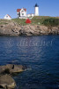 A picturesque view, across an inlet, of the Pemaquid Point Light House and the keepers house in Bristol, Maine, USA. To purchase this image, please go to my stock agency.