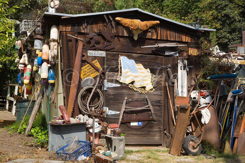 A shack in Summerland, California displays a collection of random items that combine to become a folk art display. To purchase this image, please go to my stock agency click here.