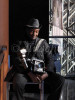 An old time African American New York City photographer displays his 4x5 press camera at the Javitts Center, To purchase this image, please go to my stock agency.