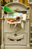 A mailbox in Brunate, Italy is overstuffed with mail. To purchase this image, please go to my stock agency click here.