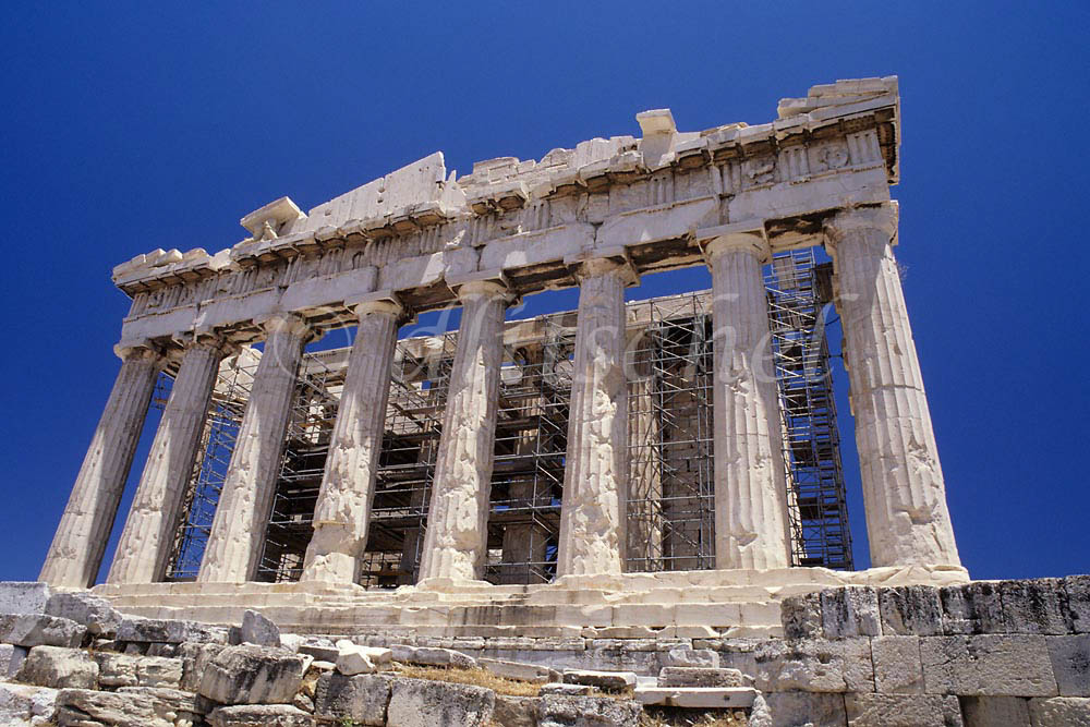 A  view, from a low angle, of the western side of the  Parthenon, located on the Acropolis of Athens in Athens Greece. To purchase this image, please go to my stock agency click here.