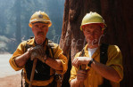 Two hotshot forest firefighters work a controlled burn in Sequoia National Park, California. To purchase this image, please go to my stock agency.