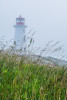 The lighthouse at Peggys Point at the small fishing village of Peggys Cove, Nova Scotia, Canada.