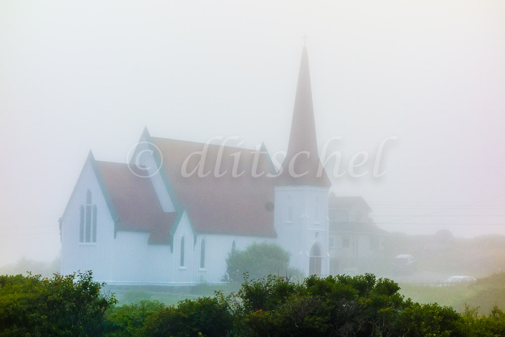 Church in fog at Peggys Cove, Nova Scotia, Canada.