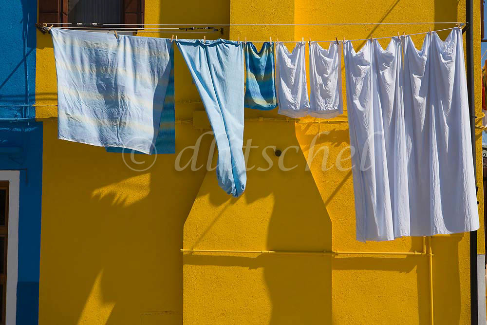 Laundry Drying in the colorful fishing village of Burano, Italy, located on Burano Island, a short commute by Vaporetto (water taxi) from Venice, Italy. To purchase this image, please go to my stock agency.
