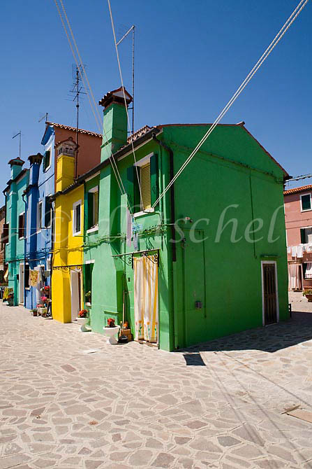 A street scene of the typical residential architecture of Burano Island, off the coast of Venice, Italy. To purchase this image, please go to my stock agency click here.